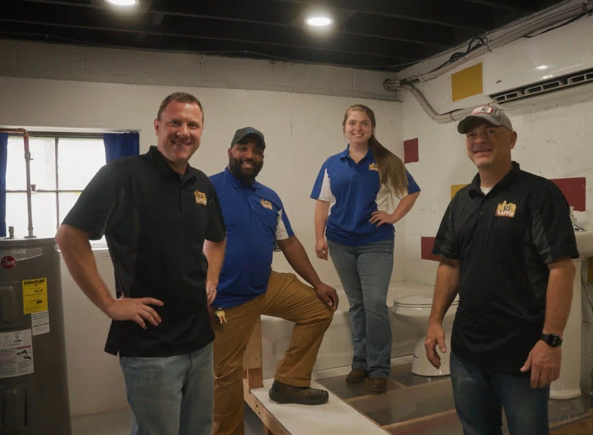 group of four people from saffer team posing