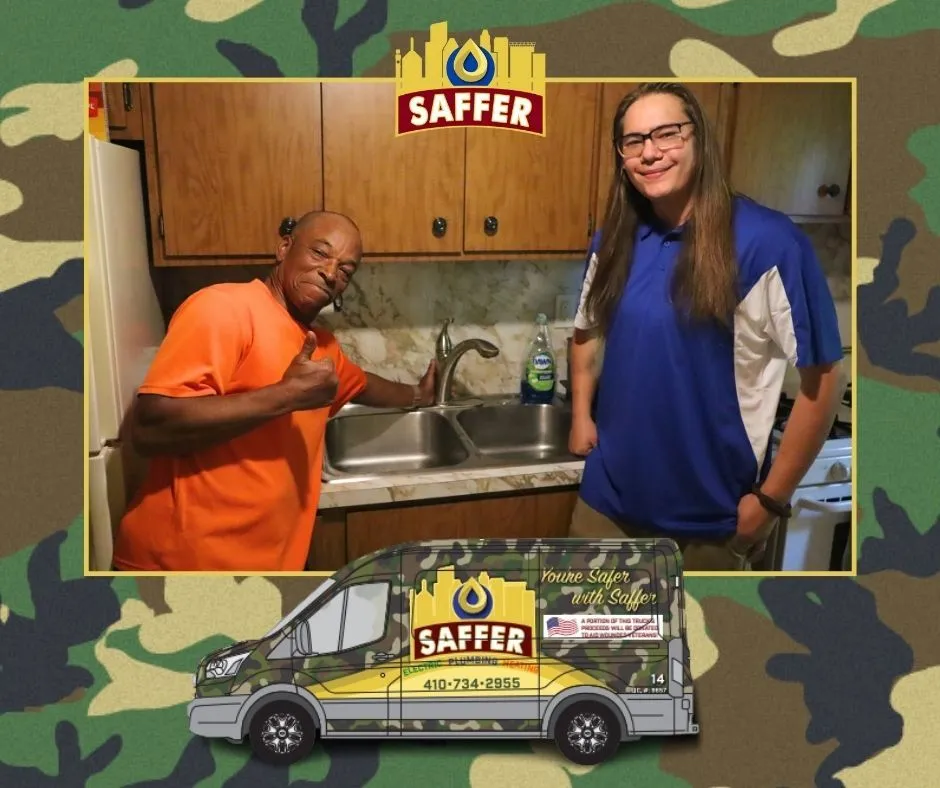 Saffer employees with veteran and camouflage van